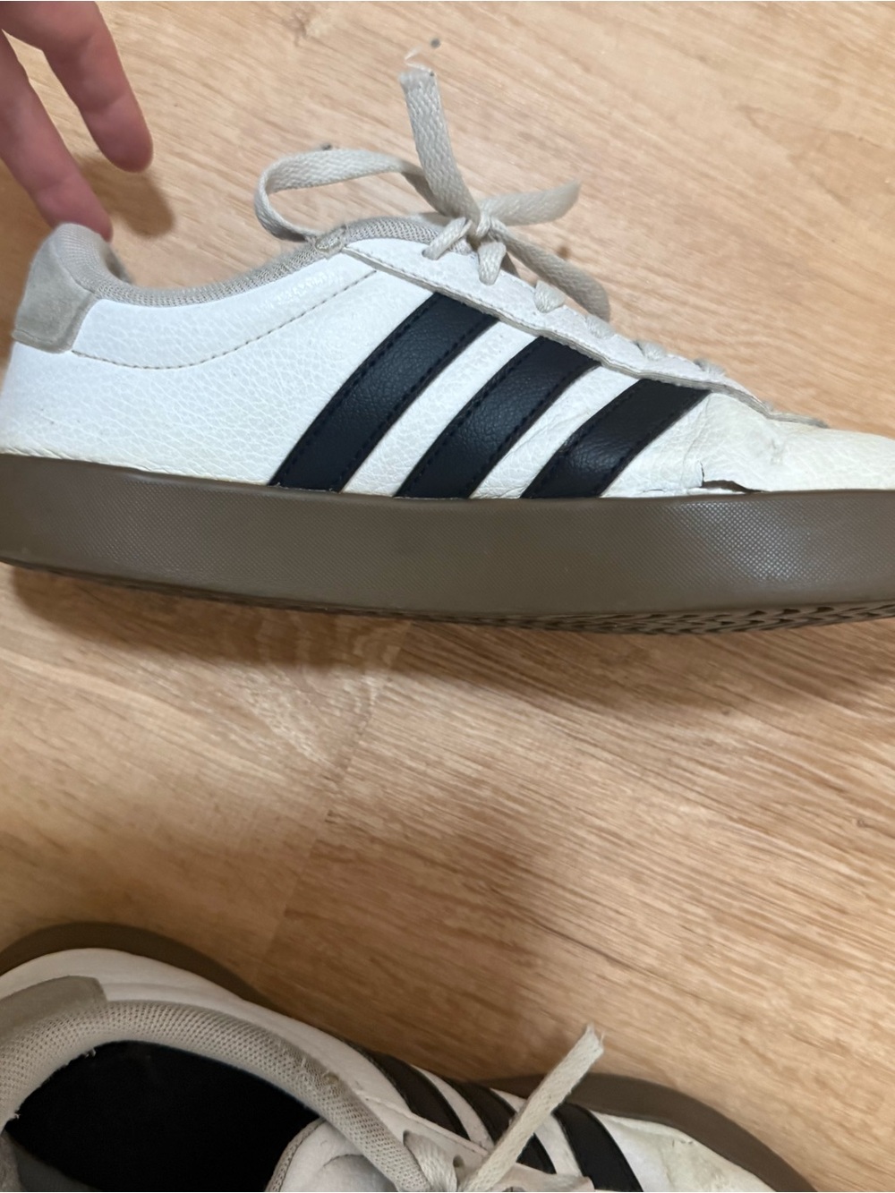 adidas White and Black Low-Top Sneakers with Gum Sole